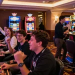 Exciting gaming scene at situs slot 10k, vibrant casino floor with enthusiastic players at slot machines